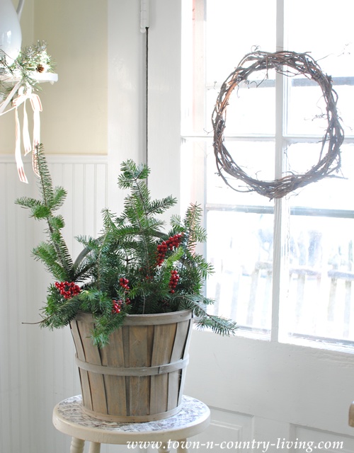 Christmas Greenery Basket via Town and Country Living