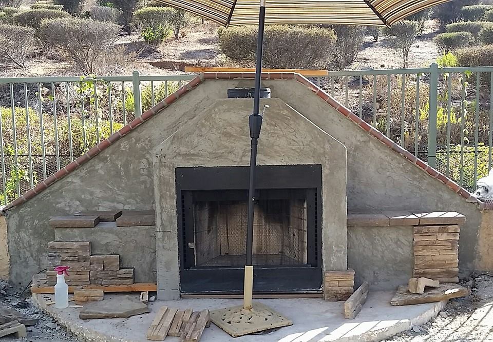 How to Build an Outdoor Stacked Stone Fireplace. Step by step tutorial with pictures and almost everything was purchased off craigslist!