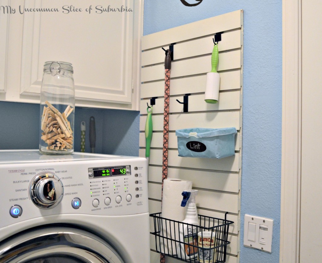 Organized laundry room using slat wall