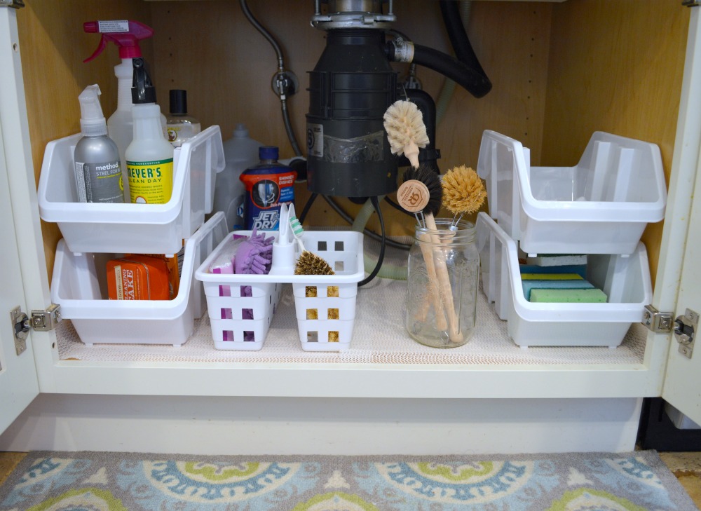Easily organize under your sink using dollar store containers!