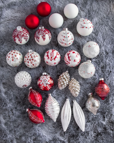 These hand-painted glass ornaments feature delicate hues of white, red, and silver, they are absolutely stunning!