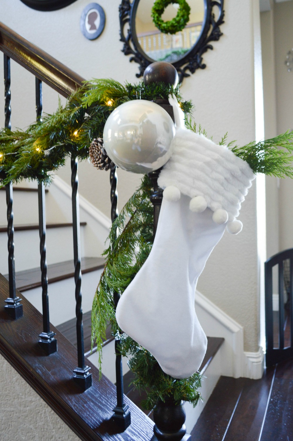 stockings-ornaments-and-garland-for-a-beautiful-stair-banister