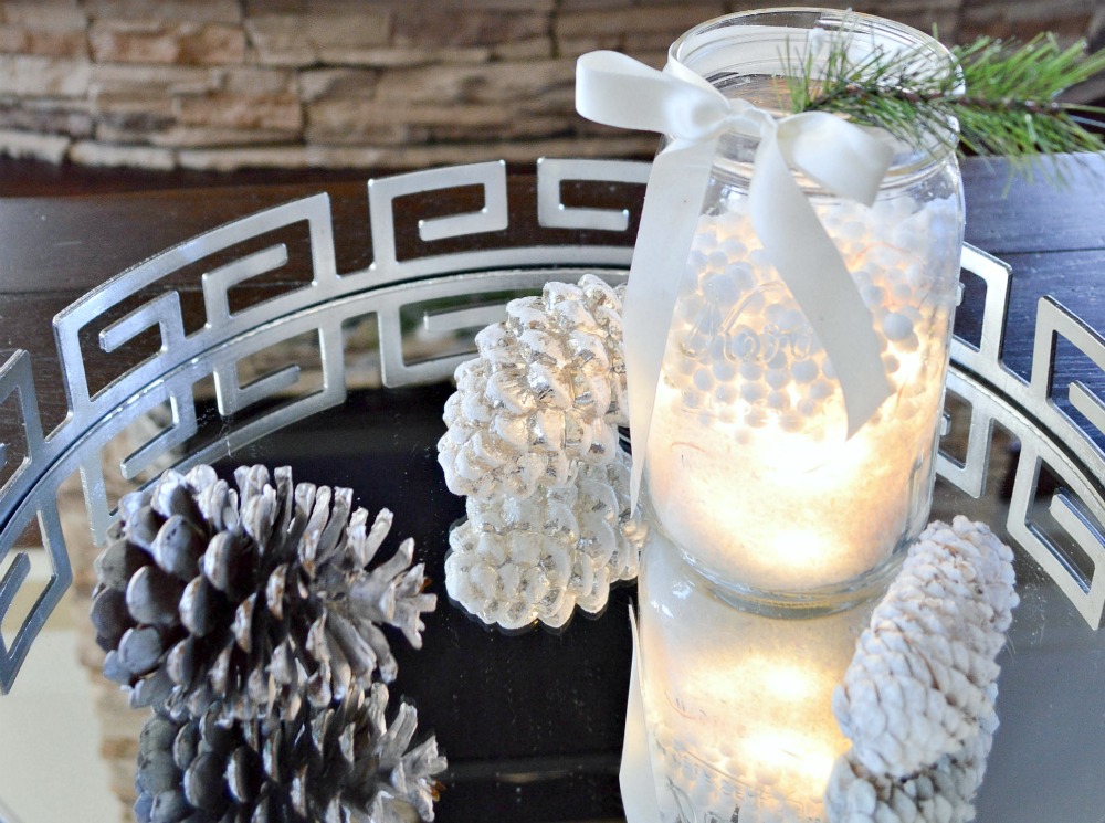 Simply fill a Mason jar with a bunch of LED lights, add fake snow and you have a beautiful winter's display