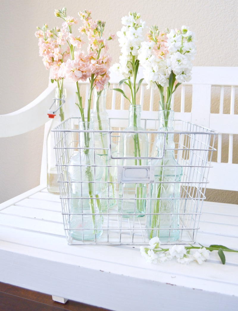 Displaying Flowers In Glass Bottles