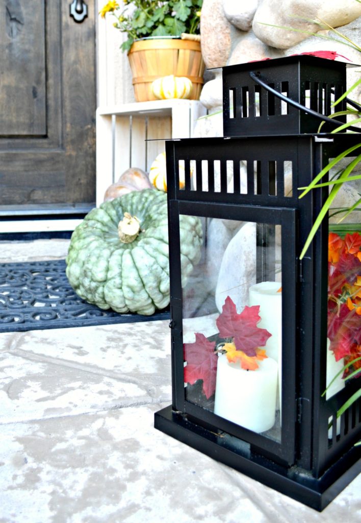 grab those lanterns laying around , add some candles and gourds and you are set for fall!