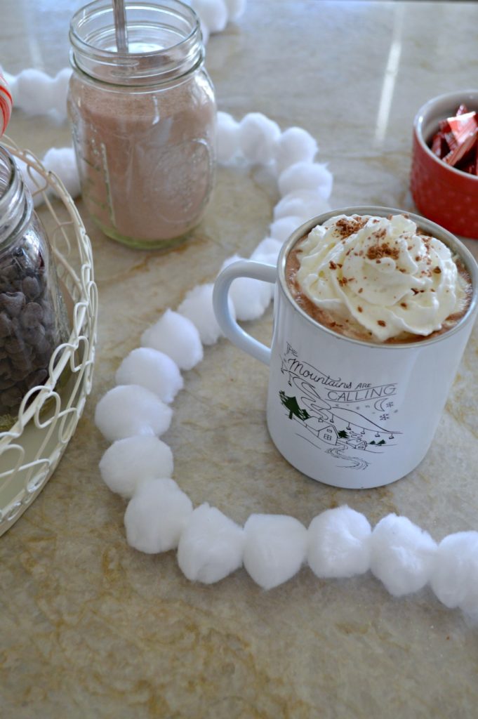 Fun hot cocoa bar set up using a tiered tray