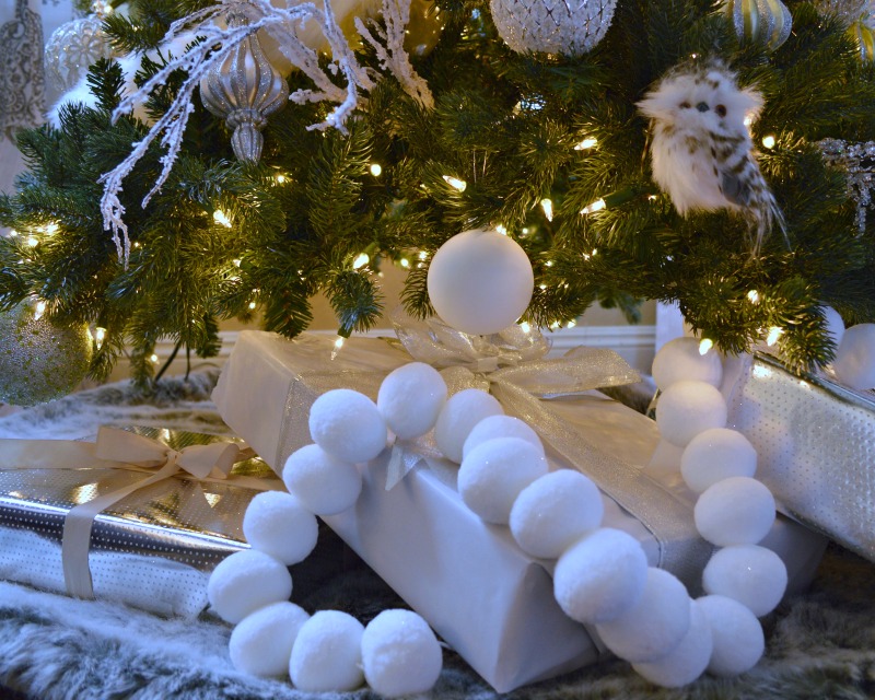 Silver white and green tree decorated with faux fur, so pretty.