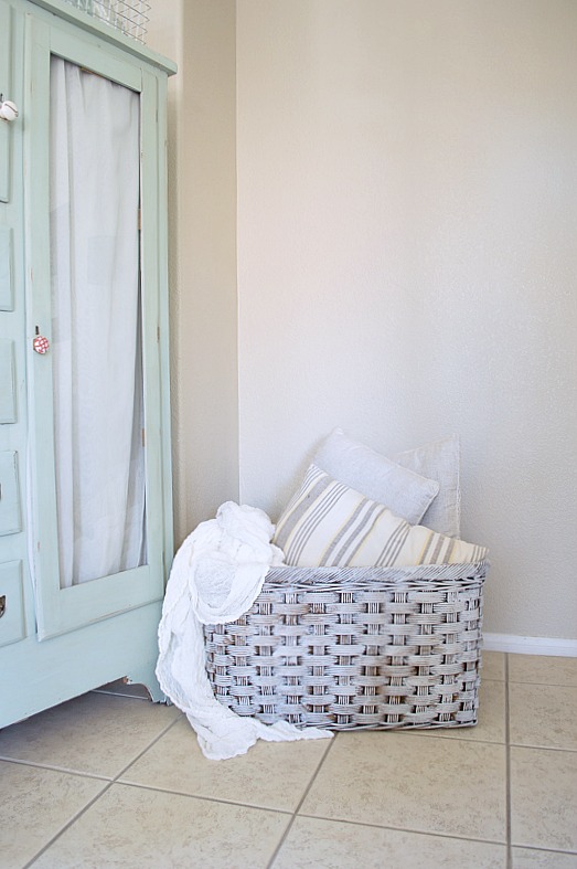 DIY Painted Farmhouse Basket. Take a thrift store basket and turn it into a beautiful Farmhouse basket with paint and wax. Great tutorial