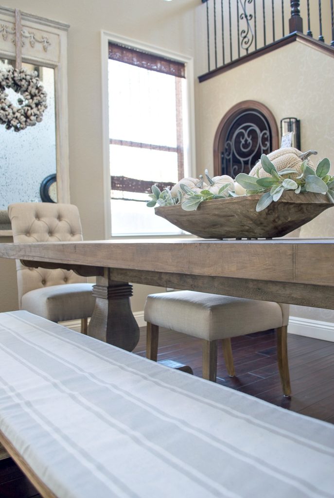 Beautiful Farmhouse dinning room surrounded by rustic elements