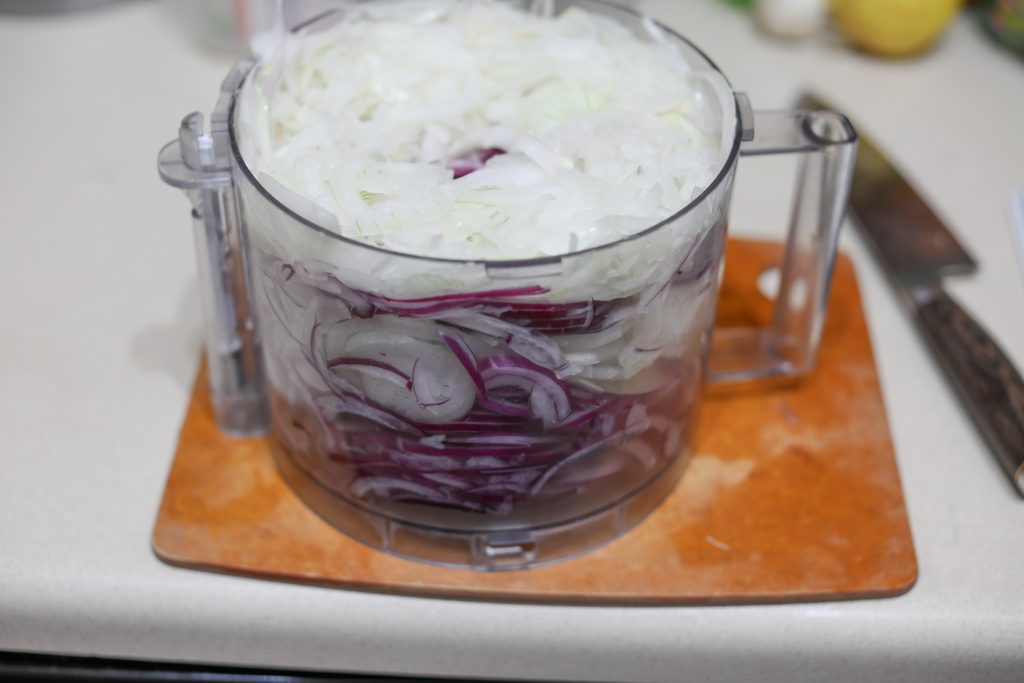 This is the most delicious french onion soup recipe in a bread bowl. French Onion Soup is the perfect comfort food on a cold winters night, everyone will know how much love you put into this meal. Caramelized onions, beef broth, melted gruyere cheese come together to form the most comforting, delicious bowl of French Onion Soup you will ever eat! 