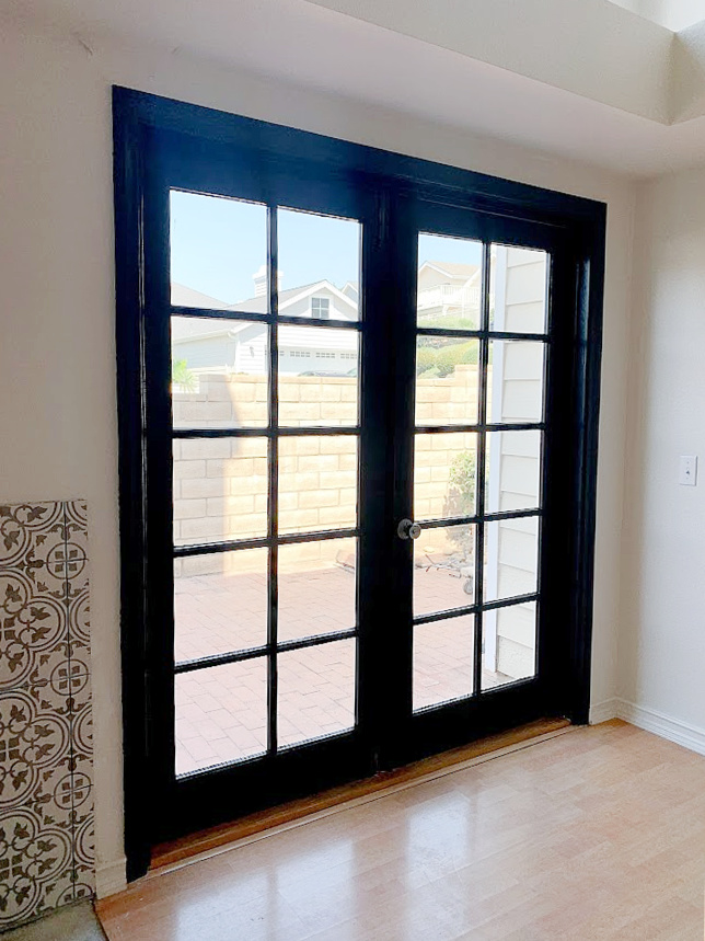 Learn how to paint interior French doors black, the easy way. No sanding or priming. These French Doors will add so much character and charm to your home.