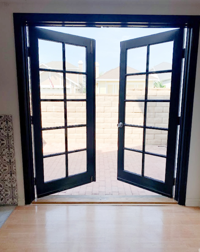 Learn how to paint interior French doors black, the easy way. No sanding or priming. These French Doors will add so much character and charm to your home.