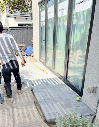 New pavers outside sliding glass doors