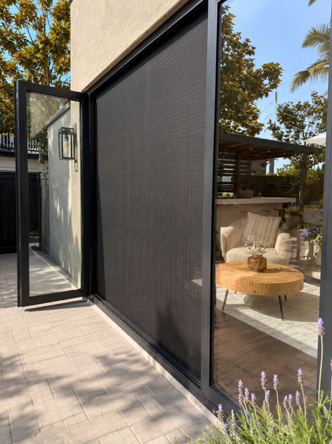 Screen door on panoramic doors